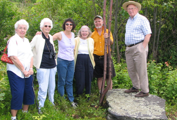 Abbie Labelle, Eddie Gerry, Janet Gerry Nelke, Barbara Purinton, David Gott, and Mark Purinton standing in the same location as the picnic left 